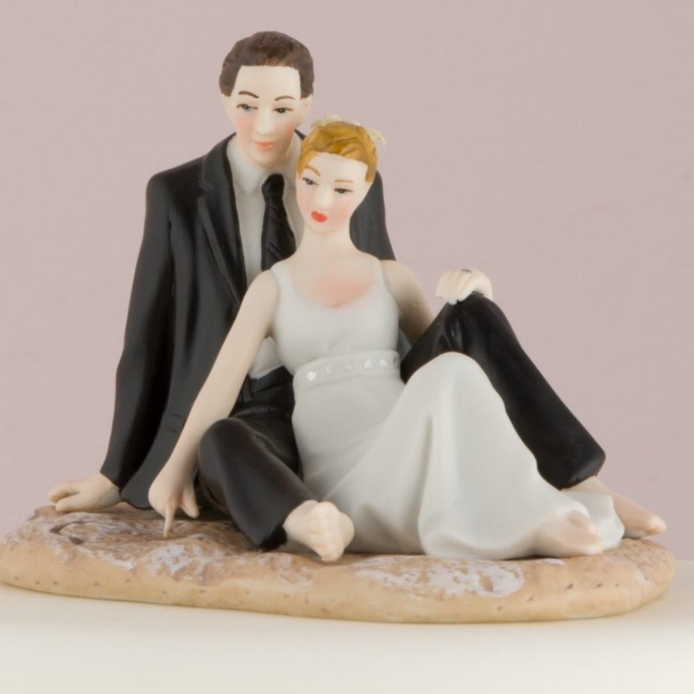 Romantic Bride and Groom couple lounging on the beach wedding cake topper.